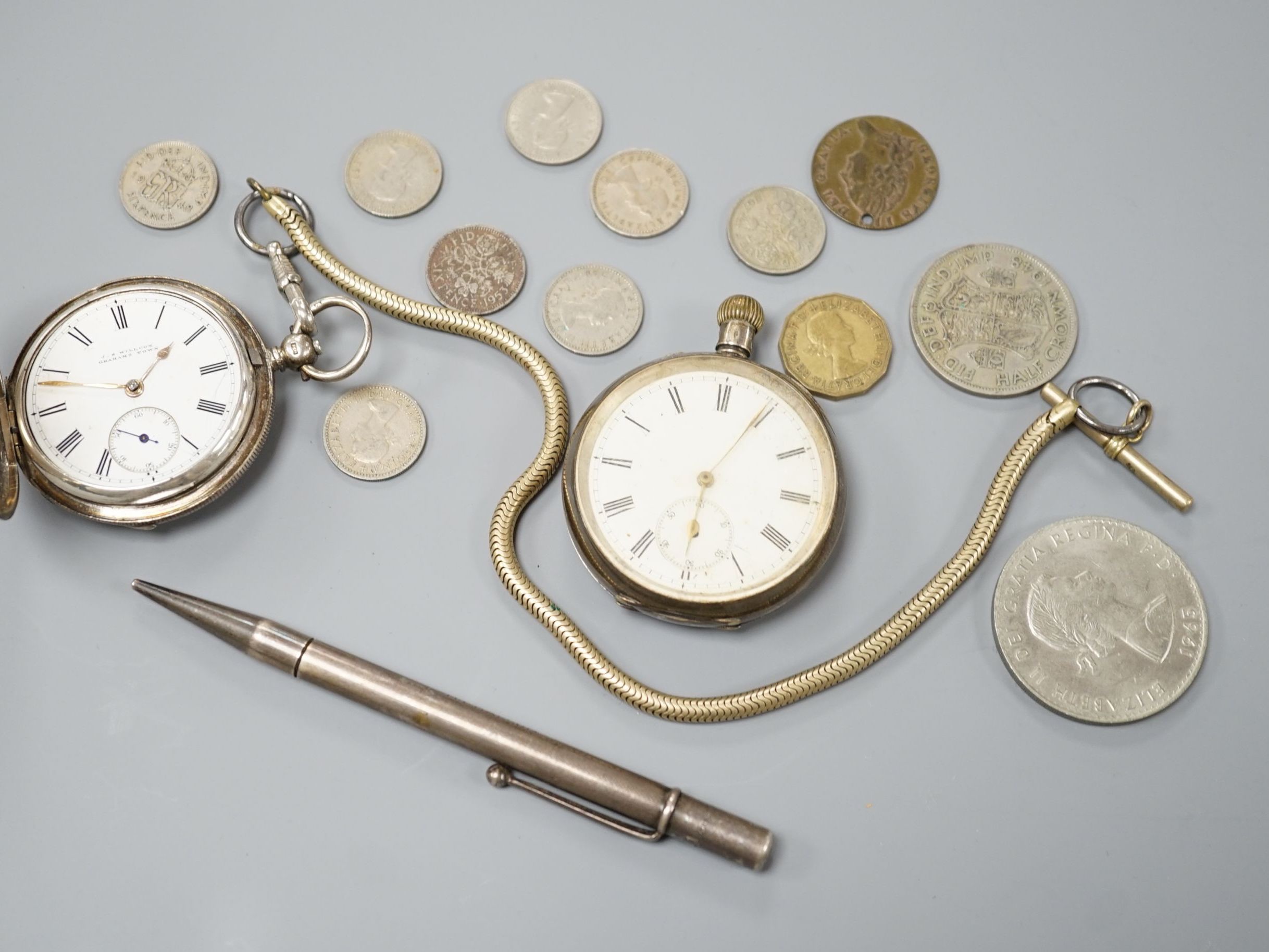 A late Victorian silver hunter keywind pocket watch, by Willcox of Grahams Town, one other white metal pocket watch, assorted minor coins and a sterling pen.